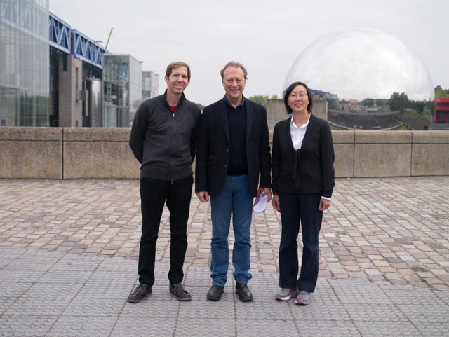 Chad Dorsey, Francois Vescia, and Sherry Hsi at Parc de la Villette, an area in Paris, known for the Cité des Sciences et de l'Industrie science museum.