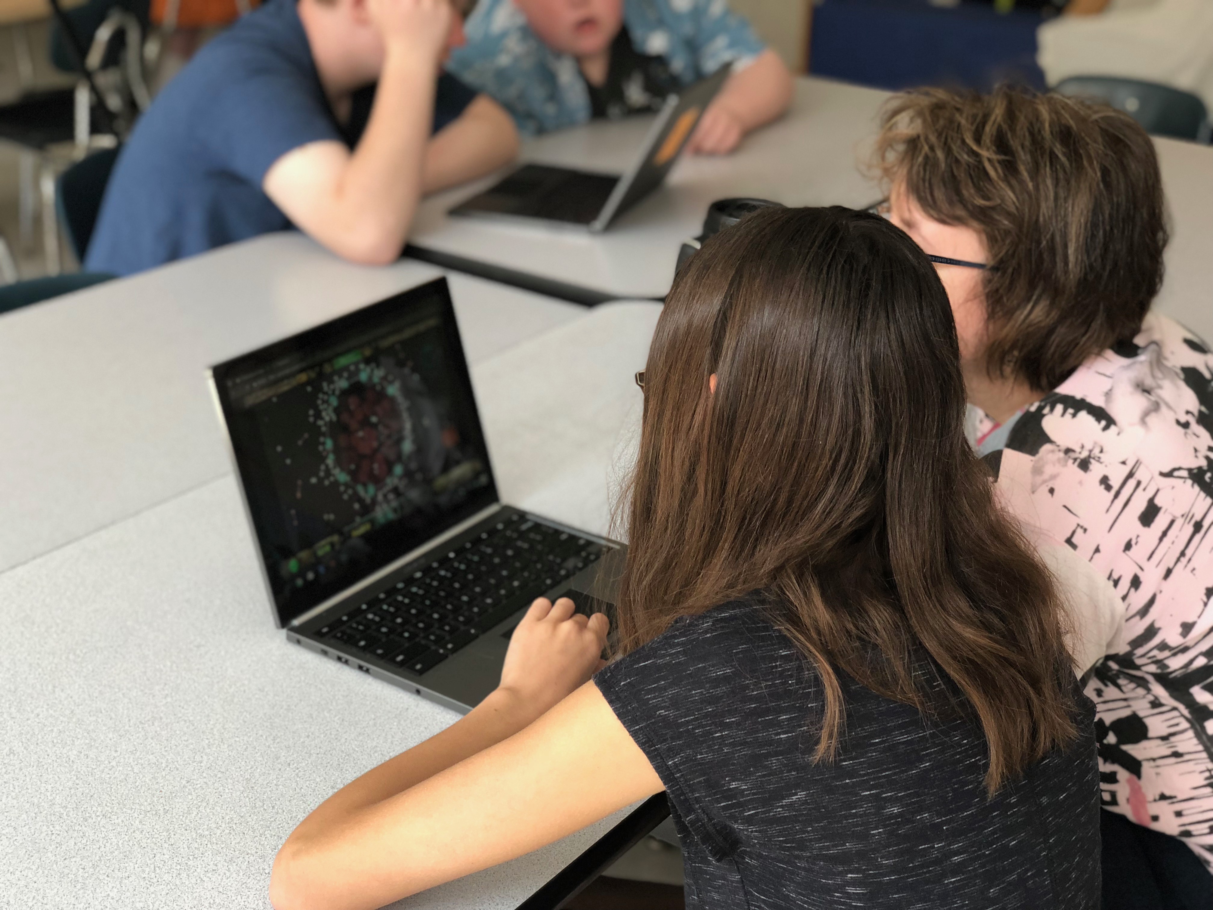Students playing Geniventure.