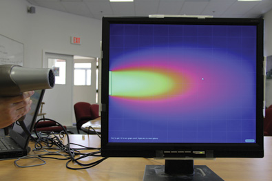 Figure 5c. Frame prototypes built around our Energy2D simulator. (c) An LCD display as a thermal imager showing the forced convection by a hairdryer.