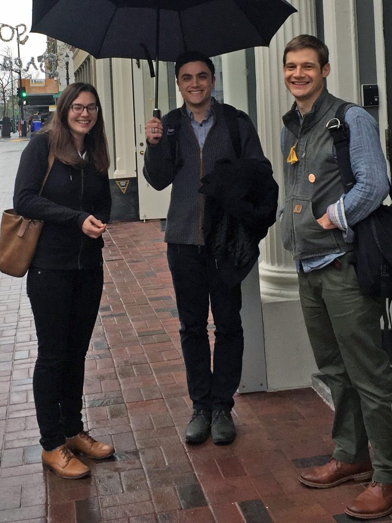 Figure 2. Lisa Hardy, Eli Kosminsky, and Colin Dixon on their first (rainy) visit to Dynamicland.