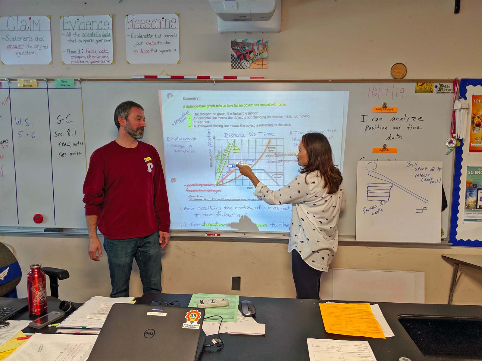 Co-teachers Michelle Murtha and JP Arsenault collaboratively teaching inclusive ninth grade physics