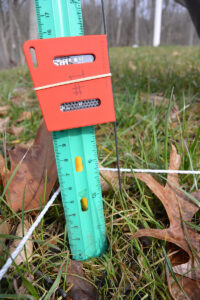 Sensor Tag used in the field to measure temperature, humidity, and light above pervious and impervious surfaces