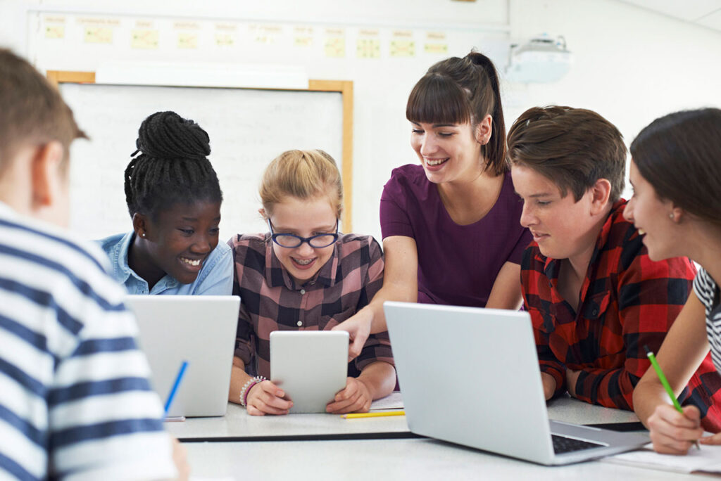 Six students collaborating on computers